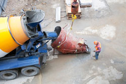 Cement truck and workers