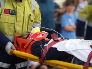 Person badly hurt on stretcher