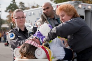 Injured person being put into ambulance