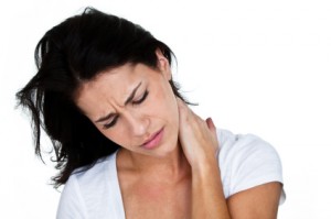 Woman holding her neck in pain