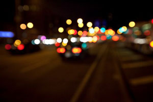 Cars driving at night in the city